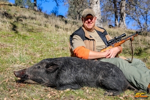 Mike A with a Wild Pig on his first ever hunting trip